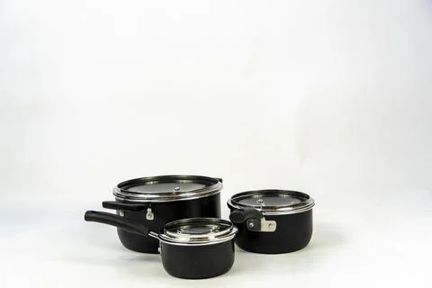 Cookware set, steel dinner set isolated on white background, black metal co.. Stock Photos