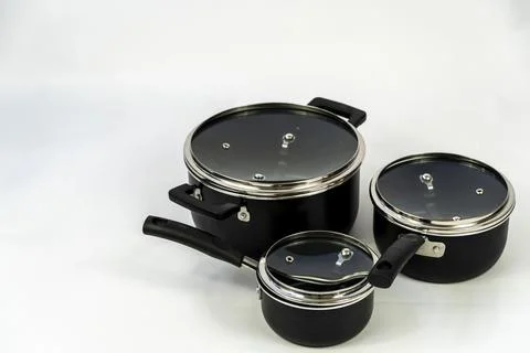 Cookware set with white bottom, cookware, metal, black handle, mexico Foto stock