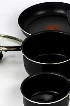Cookware set with white bottom, cookware, metal, black handle, mexico Foto stock