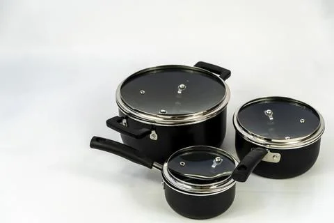Cookware set with white bottom, cookware, metal, black handle, mexico Photos