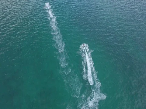 Cool Aerial shot of two jet skis riding on the ocean Stock Footage 75750788