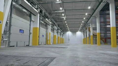 Cool angle view of the automatic gate inside the logistics center Stock Footage 104250703