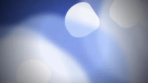 Cool blue bokeh light leaks drifting seamless loop motion background Stock Footage 343799414