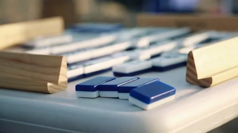 Cool close-up of Dominoes on top of a table Stock Footage 63888807