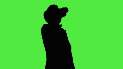 Cool cowboy in a hat with a bottle of beer Video stock 89779939
