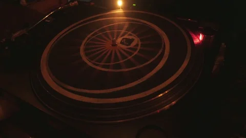 Cool dj behind the turntables performing in a bar Stock Footage 86367125