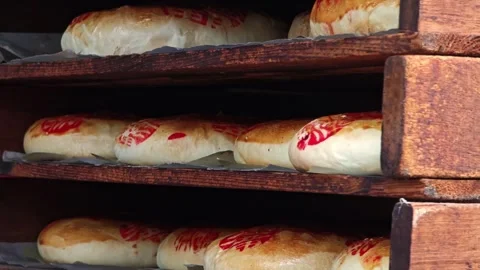 Cool down a circle moon cake with red fortune letter. Stock Footage 306759784