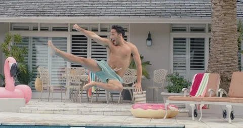 cool funny man jumping in swimming pool ... | Stock Video | Pond5