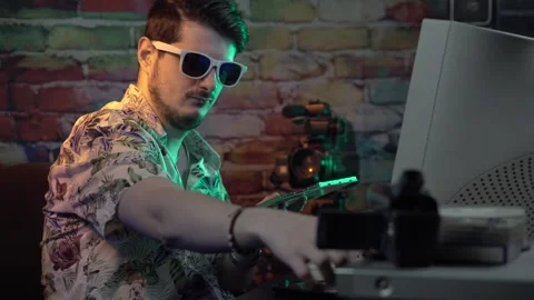 Cool Guy in Front of Desktop Computer From 2000's Inserting Disk in CD DVD Stock Footage 305818354