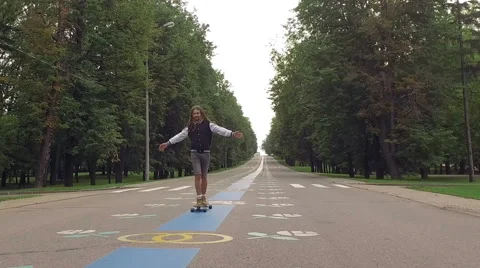 Cool guy on his longboard skate Stock Footage 65289458