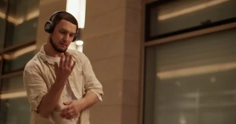 Cool guy performing dance on street Stock Footage 244474710