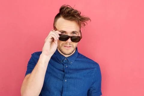 Cool guy standing with with sunglasses Stock Photos