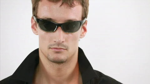 Cool guy is throwing the cards into the camera Vídeos de archivo 823046