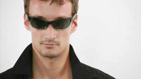 Cool guy is throwing the cards into the camera Stockbeeldmateriaal 823054