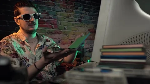 Cool IT Guy or Programmer From 1990's Receiving New CD Disk From Coworker and Stock Footage 305819097
