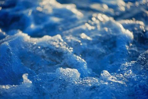 Cool light reflected on cold bubbling water Stock Photos