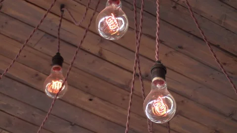 Cool lightbulbs hanging in restaurant Stock Footage 167139905