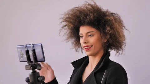 Cool looking hipster making video Stock Footage 104747681