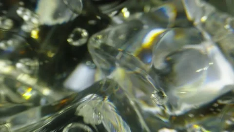 Cool Macro shot of a clear glass with ice, black background. Stock Footage 131753187