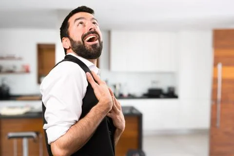 Cool man looking up inside house Stock Photos