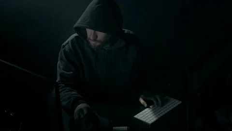 Cool programmer cracking code smoking and typing dolly shot Stock Footage 86437842