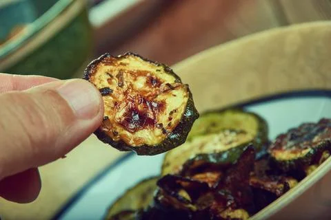 Cool Ranch Zucchini Chips Cool Ranch Zucchini Chips, toss zucchini with oi... Stock Photos
