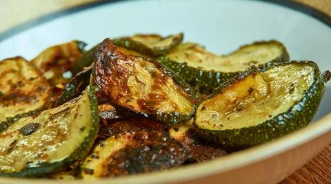 Cool Ranch Zucchini Chips Cool Ranch Zucchini Chips, toss zucchini with oi... Stock Photos