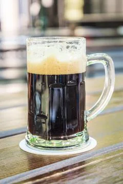 Cool Refreshing Dark Beer in a big glass Stock Photos