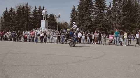 Cool riding a motorcycle. Performed by biker. The motorcycle show. Stock Footage 112334450