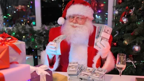 Cool Santa shaking many stacks of dollars on Christmas celebration background Stock Footage 256156484