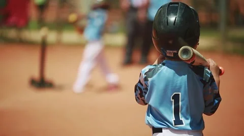 Cool shot of kid ready to bat during baseball game Stock Footage 51112558