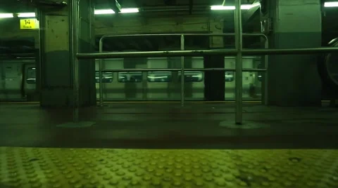 Cool shot of train passing by at underground subway station Stock Footage 67366444
