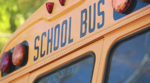 Cool shot of the words "School Bus" on top of a school bus. Stock Footage 61298931