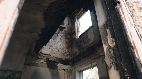 Cool shots of a dilapidated building. Charred, broken walls Stock Footage 128267483