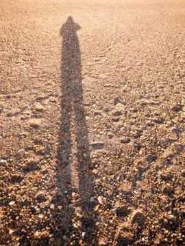 Cool silhouette reflection shadow shade in sand beach cobble texture floor Stock Photos