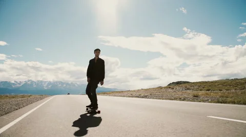 Cool skater doing a stunt on his skateboard Stock Footage 65485686