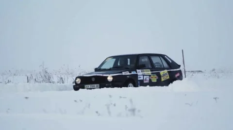 Cool sport rally car ride on snow road from close 库存影片 59643924
