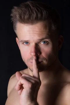 A cool stretch from an attractive athletic guy. Stock Photos