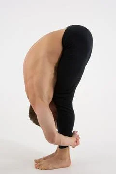 A cool stretch from an attractive athletic guy. Stock Photos