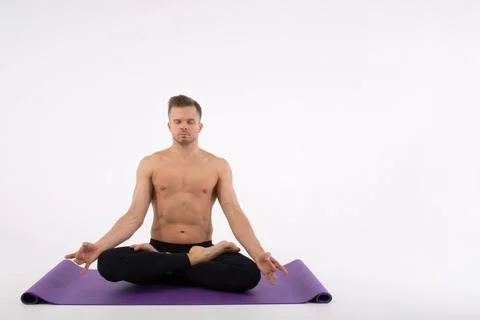 A cool stretch from an attractive athletic guy. Stock Photos