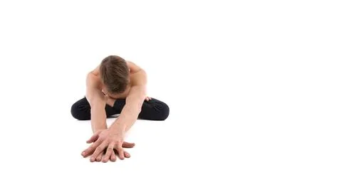 A cool stretch from an attractive athletic guy. Stock Photos