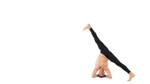 A cool stretch from an attractive athletic guy. Stock Photos