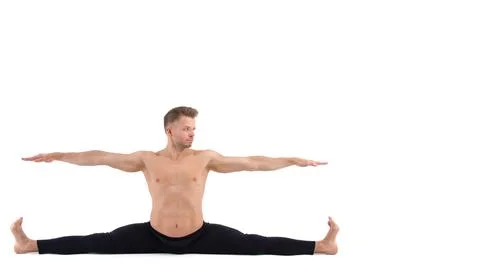 A cool stretch from an attractive athletic guy. Stock Photos