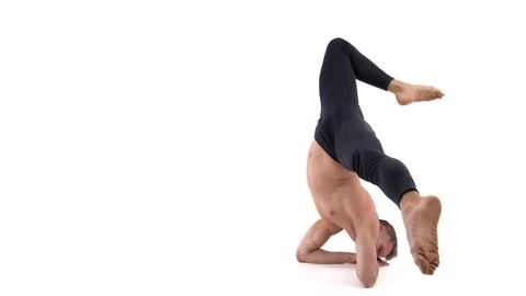 A cool stretch from an attractive athletic guy. Stock Photos