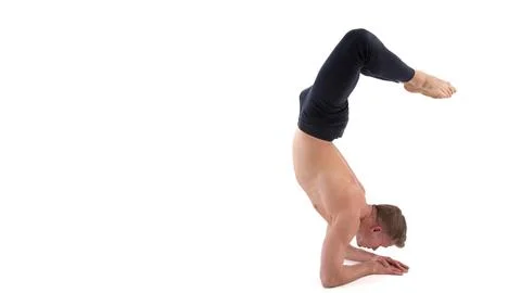 A cool stretch from an attractive athletic guy. Stock Photos