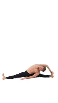 A cool stretch from an attractive athletic guy. Stock Photos