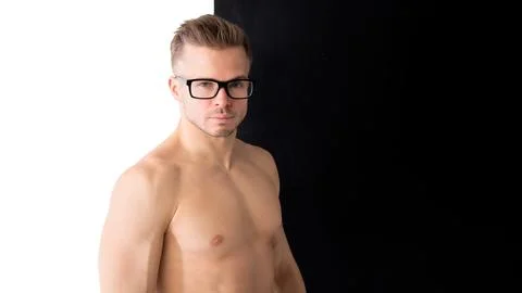 A cool stretch from an attractive athletic guy. Stock Photos
