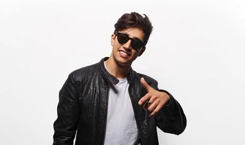 Cool young man pointing forward Stock Photos