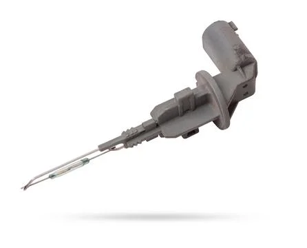 The coolant level sensor is black on a white background with metal elements.. Stock Photos