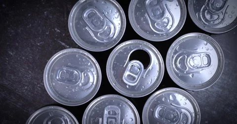 Cooled soda cans ready to drink on black background 스톡 동영상 245944872